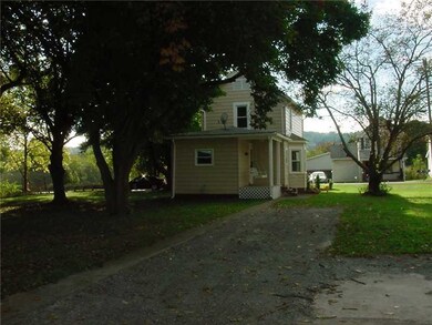 Yard/Garden. Driveway to the rear of the home with
