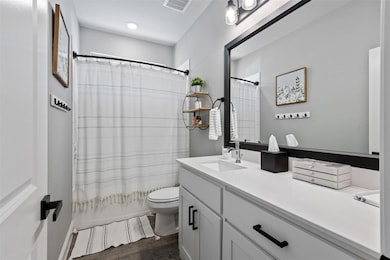 Full bathroom with visible vents, shower / bathtub