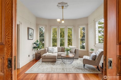Gorgeous pocket doors lead to formal dining room.