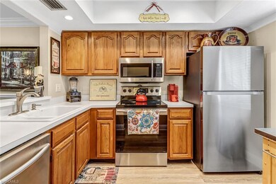 Kitchen with sink, light hardwood / wood-style flo