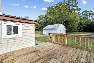 Wooden deck with a garage