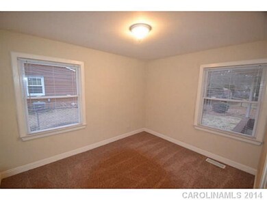Bedroom - New carpet and freshly painted in two to
