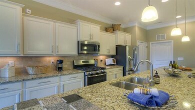 The photo shown is representative of the home - Ki