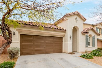 Mediterranean / spanish house featuring driveway,