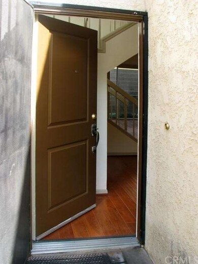FRONT DOOR LEADING TO OPEN FLOOR PLAN