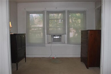Sun Room on the first floor unit.  A/C units are n