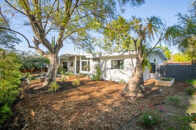 Low maintenance landscaping with raised bed gardens