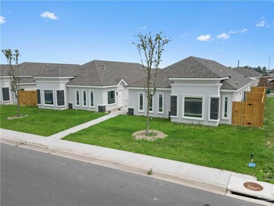 Ranch-style house with a front lawn