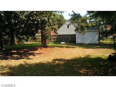 Exterior Back - Large and shady.  Note the shed, i