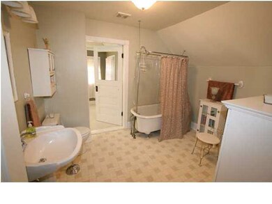 Old fashioned soaker tub in spacious Bath Room
