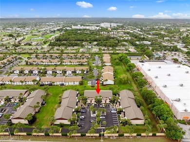 Aerial view of property and surrounding area with