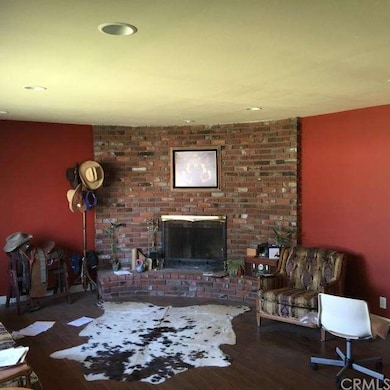 LIVING ROOM WITH COZY FIRE PLACE
