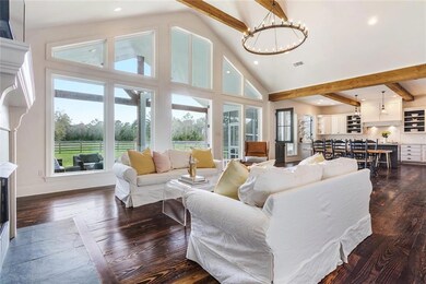 Enjoy the open kitchen-dining space while observin