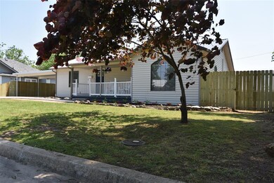 View of front of property featuring a front yard