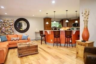 Spacious open living room with view of Kitchen