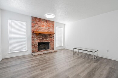 Unfurnished living room with light hardwood / wood