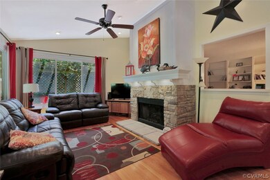 Family Room with hardwood floors, vaulted ceiling