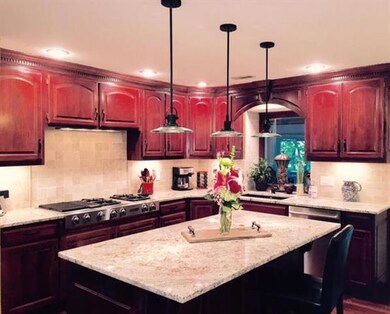 Kitchen...New granite countertops...gas cooktop wi