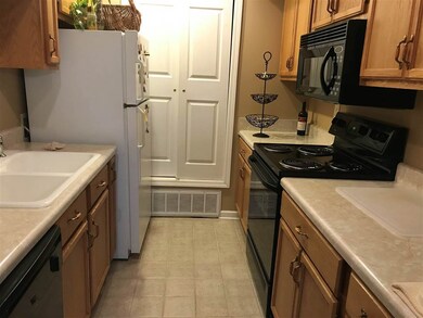 Solid wood cabinets and coffered ceilings