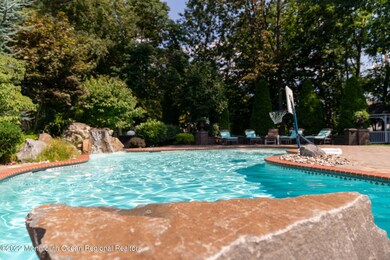 GUNITE SYLVAN SWIMMING POOL W/WATERFALL