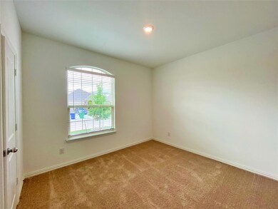 Spare room with light carpet