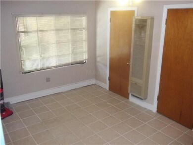 MESS FREE TILE FLOOR! DOOR LEADING TO PATIO, TOO!