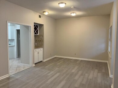 Unfurnished room with light wood-style flooring a