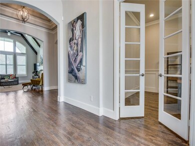 Bright entry leads to study with French doors on r