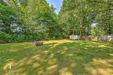 Backyard firepit, storage building