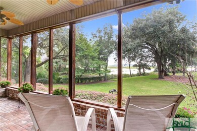 This screened porch is sure to be a favorite spot 