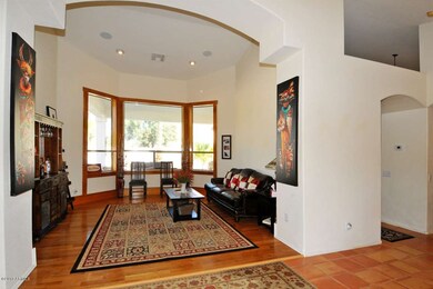 Formal living room with arched