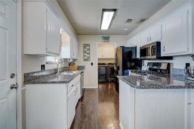 Kitchen featuring stainless steel appliances, sepa