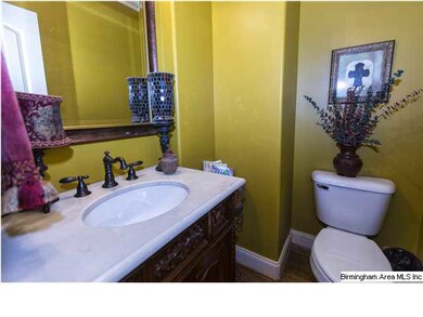 Guest half bath on main level.