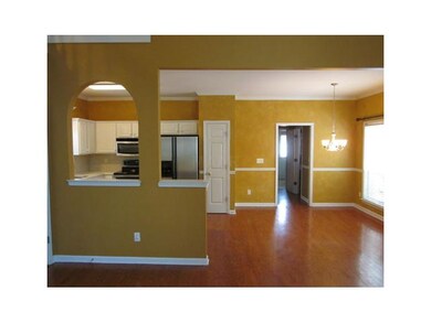 Here you can see the kitchen and the dining room.