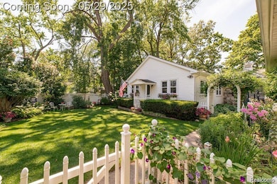 Absolutely stunning fenced-in front yard