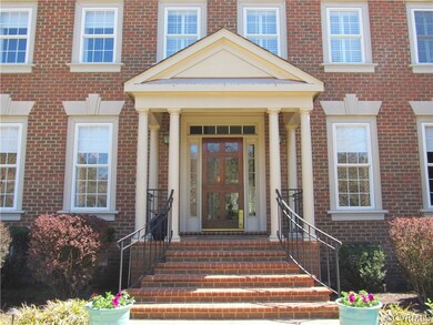 Welcoming covered front porch. All windows have bu