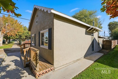 View of side of property with stucco siding
