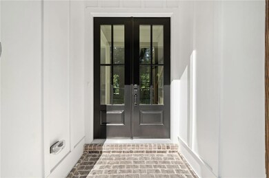 Property entrance with french doors