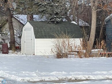 Storage shed - new siding and shingles