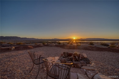 Yard at dusk with a mountain view