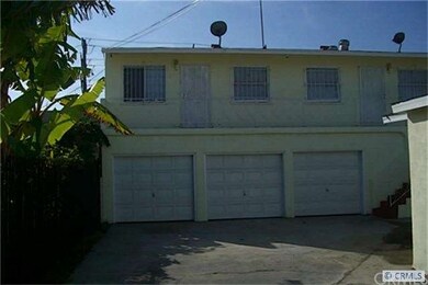 2 Story duplex with 3 car garage and storage