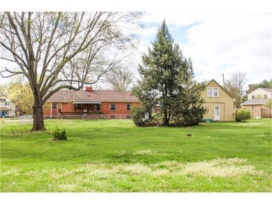 Rear view of house and guest cottage