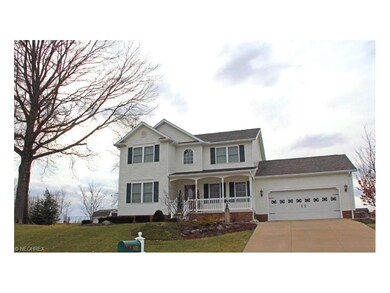 close up of front with large covered front porch