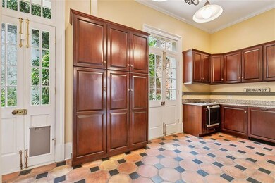 1st floor kitchen opening to courtyard area