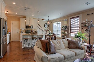 Den and Kitchen with Breakfast Bar, Granite, Stain