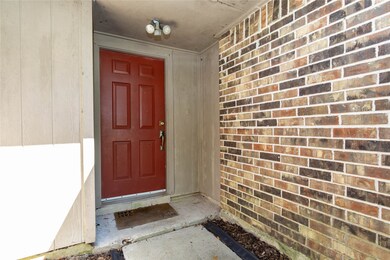 Red front door welcomes you home!