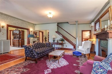 Another view of living room through entry way to s