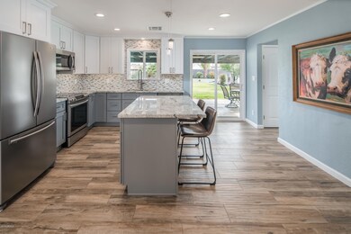 Wide view of kitchen