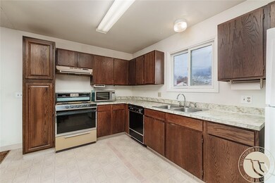 Kitchen with oak cabinets