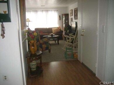 Light and Bright Living Room from Family Room Alco